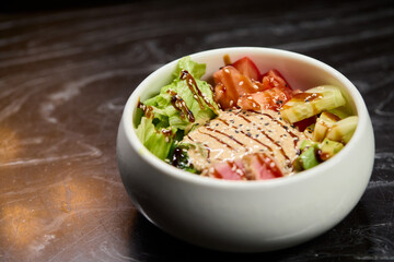 A Fresh and Colorful Salad Bowl that features Grilled Chicken and a Variety of Vegetables