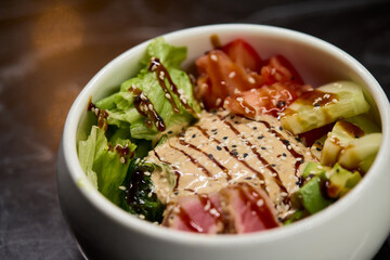 A Fresh and Colorful Salad Bowl that features Grilled Chicken and a Variety of Vegetables