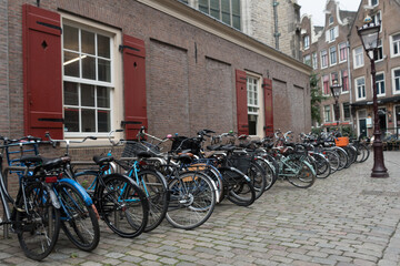 Bicycles on a parking rack behind Oude Kerk