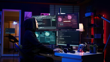 Frustrated hacker in secret hideout dejected after failing to attack victims using malware. Annoyed...