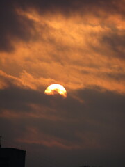 sunset in the sky
big sun in clouds