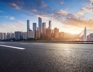 asphalt road and city skyline with modern buildings in chongqing at sunrise