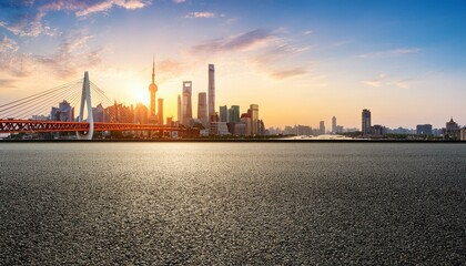 Fototapeta premium asphalt road square and bridge with city skyline at sunset in shanghai