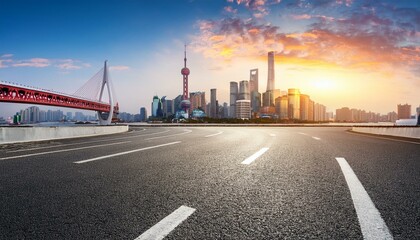 Fototapeta premium asphalt road square and bridge with city skyline at sunset in shanghai
