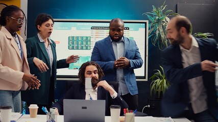 Sick and tired employee throwing the badge in front of the manager, exhausted working under...