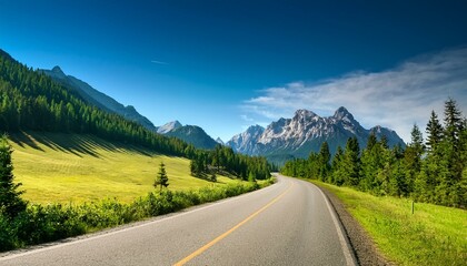 Naklejka premium country road and green forest with mountain natural landscape on a sunny day