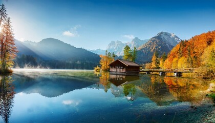 fabulous autumn scene of sunny morning on almsee lake