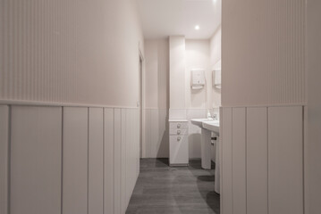 Toilet: Generally made of ceramic, with a flush tank and seat