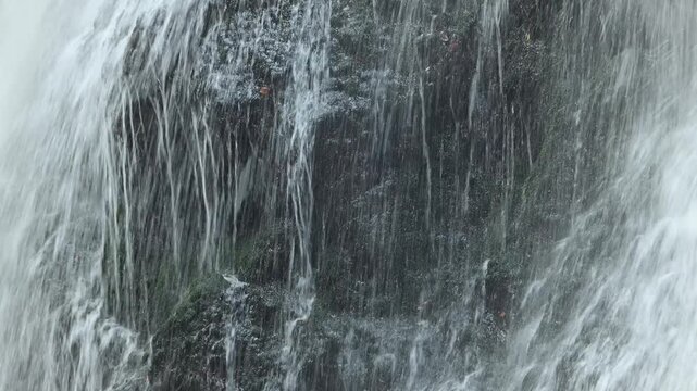 Closeup of a waterfall flowing over mossy stones, Josefsthaler Wasserf&auml;lle