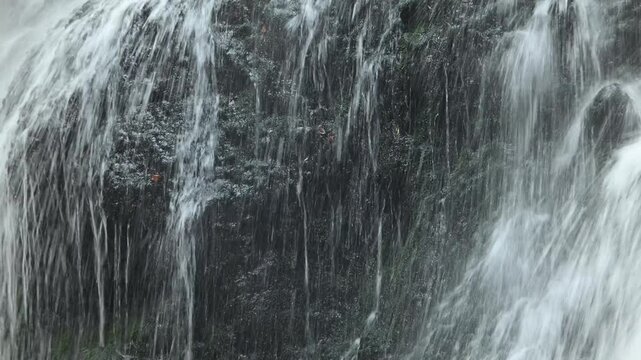 Closeup of a waterfall flowing over mossy stones, Josefsthaler Wasserf&auml;lle