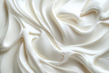 Obraz premium Close-up of smooth creamy swirls in glossy white texture showcasing minimalistic design and high-quality detail