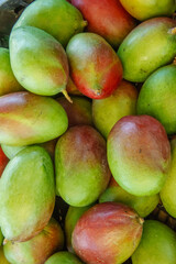 Fresh, healthy, organic, and local mango produce and fruit sold in an open air market