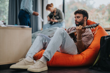 Students engaged in a music class at college, playing guitar and enjoying a relaxed learning atmosphere. Creative collaboration and musical expression are highlighted.