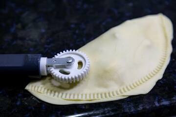 Traditional rustic Brazilian pastry, fried and stuffed with ground beef