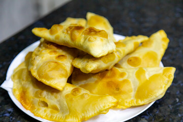 Traditional rustic Brazilian pastry, fried and stuffed with ground beef