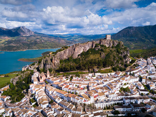 Picturesque scene of whitewashed village Zahara de la Sierra and mountain lake, Spain © JackF