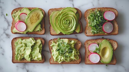 Variety of avocado toast with radish and microgreens on marble surface