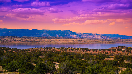 Autumn sunset landscape over the mountains and Abiquiu Lake in New Mexico, USA