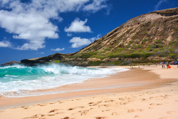 Large waves breaking on the shore at Sandy Beach on the island of Oahu in Hawaii