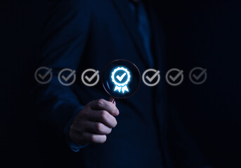 Businessman holding quality certification mark, audit, business, assurance, control, digital, service, complete, assessment, checklist, data with quality icon.