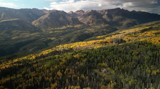 Aerial of mountain cabin in San Juan Mountains in fall in southern Colorado