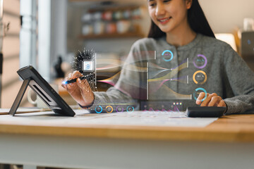 woman using tablet with digital data visualization, smiling while working on project. scene conveys sense of innovation and productivity