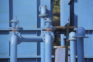 The pipes connected to the clean water storage tank in the clean water treatment plant. Clean water is then distributed through pipes to residents.