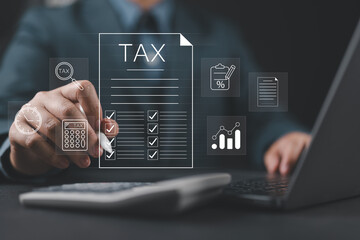 Tax and Vat concept. Government, state taxes concept. Businesman using tablet and laptop to...