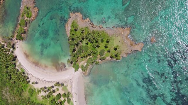Playa Los Coquitos beach, Cabrera in Dominican Republic. Aerial top-down view and vertical format