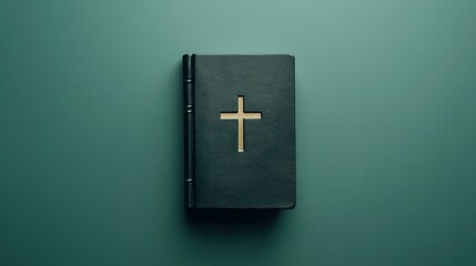 A minimalist image of the Bible isolated against a solid green background. The book's simple leather-bound cover and cross emblem stand out, emphasizing simplicity and faith 