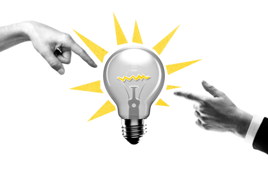 Hands pointing at lightbulb with yellow rays on white background