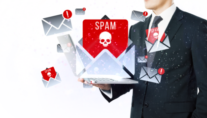 Businessman holding laptop with spam email alerts, white background