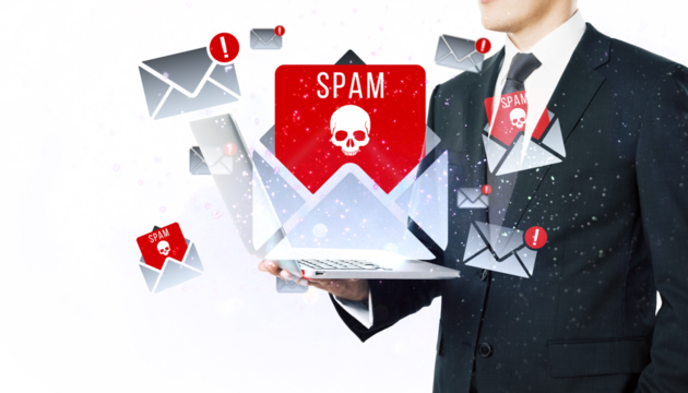 Businessman holding laptop with spam email alerts, white background