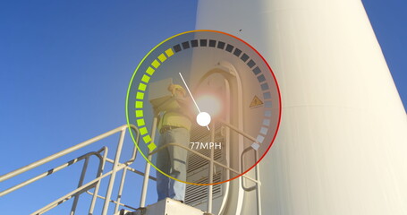 Image of speedometer over windmill