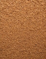 light brown corkboard with visible holes and natural imperfections, texture of sand