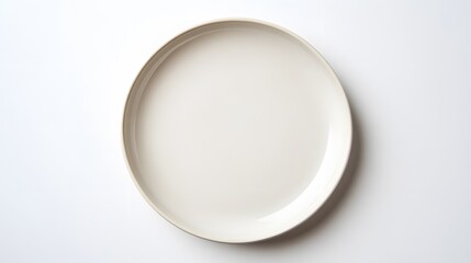 Empty ceramic round plate isolated on white background. 