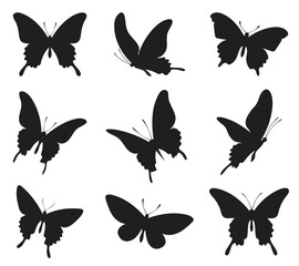 Nine Black Butterfly Silhouettes In Flight