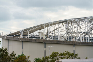 Fototapeta premium Tropicana Field roof damaged by Hurricane Milton 2024