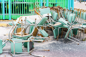Chairs left outside for bulk pickup St Petersburg beach aftermath Hurricane Milton