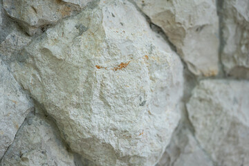 Big piece stones wall in gray color. Background and texture.