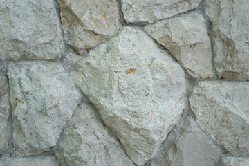 Big piece stones wall in gray color. Background and texture.