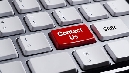 close-up view of a computer keyboard focusing on a unique Contact Us key. Contact us copy space 