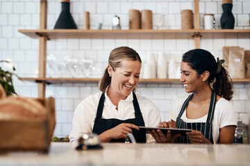 Business women, cafe and laughing with tablet in small bakery for new recipe or service at retail...