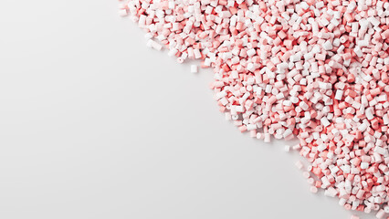 Closeup top view on pink plastic polypropylene granules heap on white backdrop, masterbatch polymer grain pile. HDPE or PVC resin pellets. 3d render illustration