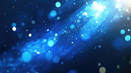 Obraz premium A visually stunning abstract design showcasing a radiant blue background with dazzling lens flares, perfect for use in presentations, websites, or digital media.