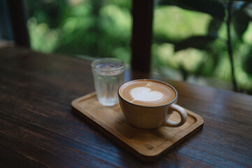 At quaint cafes, the barista skillfully poured a hot drink, crafting a velvety cappuccino topped with rich foam, perfect for breakfast and a delightful caffeine boost.