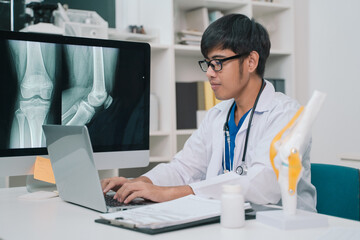 At the hospital clinic, the doctor examined the x-ray of the patient's knee, assessing the bone and joint to ensure proper care and promote overall health through medicals.