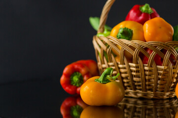 ripe red and yellow sweet peppers.