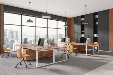 Modern office interior with desks, chairs, and computers in a high-rise building. 3D Rendering