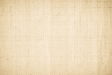 Closeup detail of beige fabric texture background. High resolution photo.